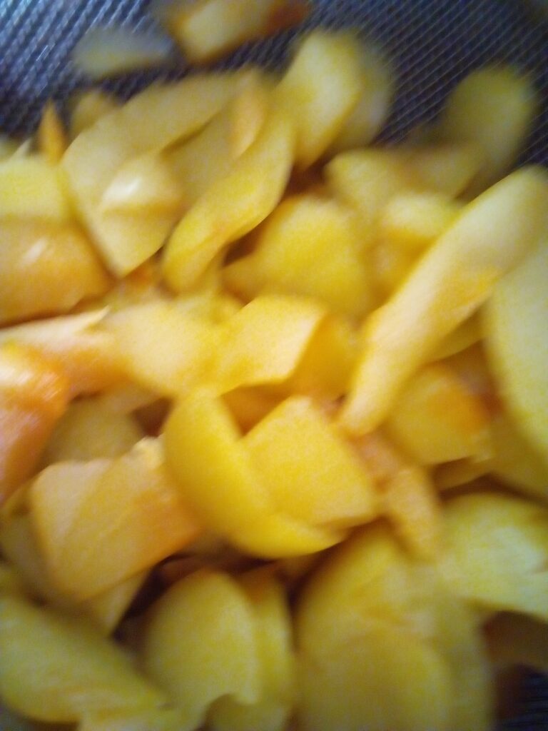 Apple cider vinegar with natural “mother” forming during fermentation