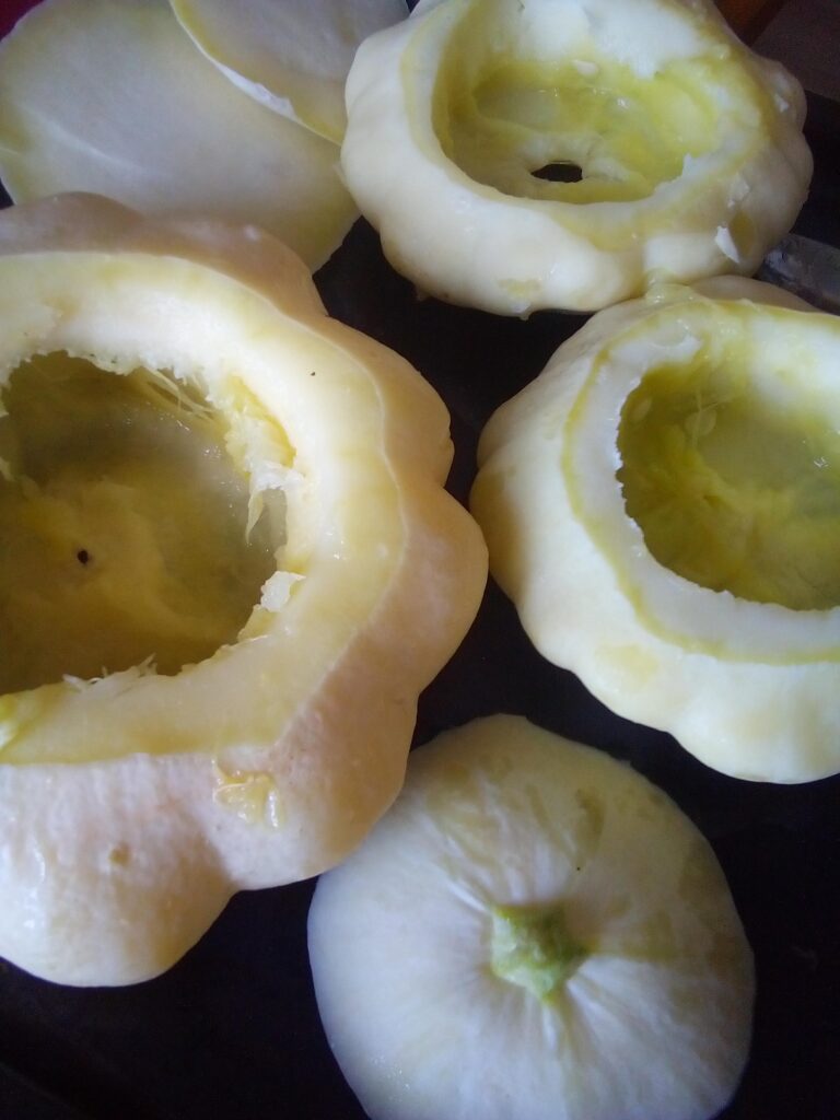 Golden baked stuffed summer squash with melted cheese topping