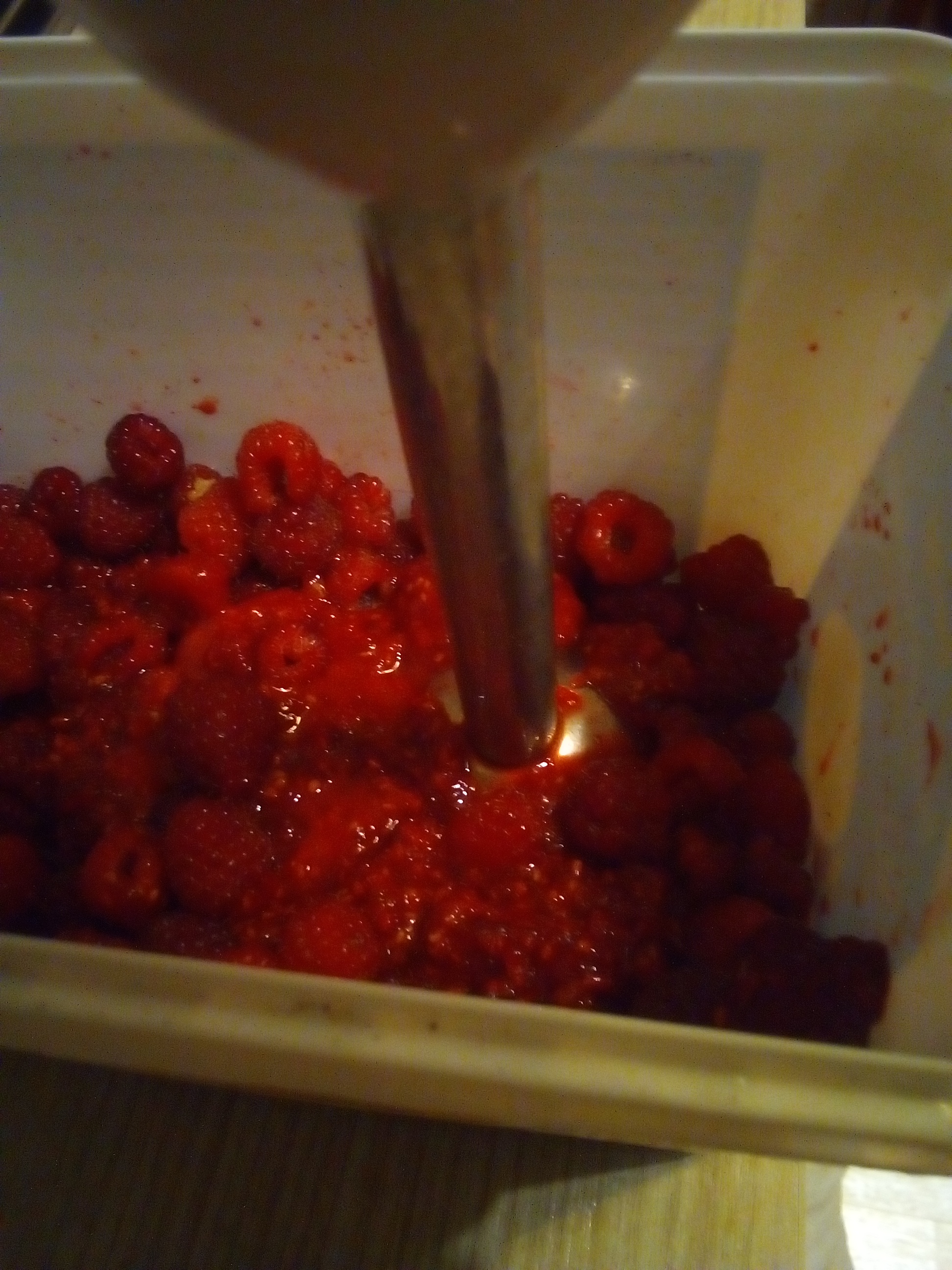 Fresh raspberries blended into smooth puree for homemade fruit leather.