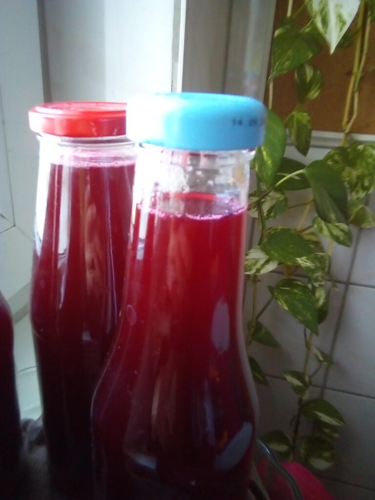 Homemade cherry juice made by heating cherries without stirring.