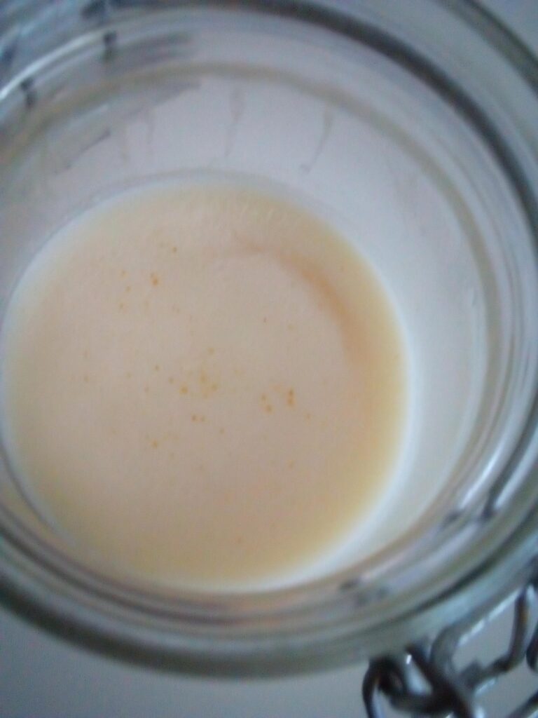 4.	Rendered goose fat being filtered slowly for a clean final result.