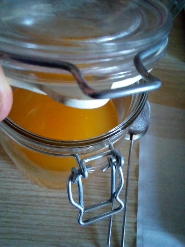 11.	Homemade goose fat being clarified for better shelf life.