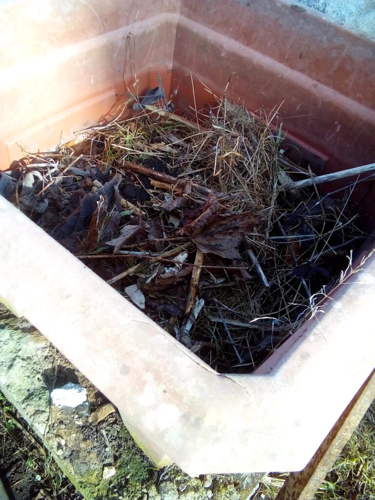 Drainage setup in raised garden beds to prevent waterlogging and improve soil health.