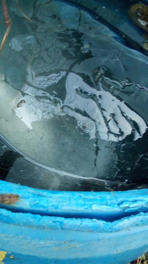 when to start gardening after winter ice block floating in rain barrel early spring