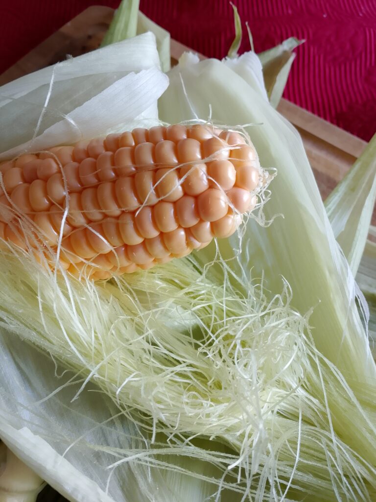 How to meal prep vegetables for the week: cooked corn is an easy kid-friendly option that I prepare ahead and keep ready for our little vegetable buffet.